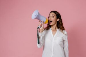 Woman speaking into megaphone