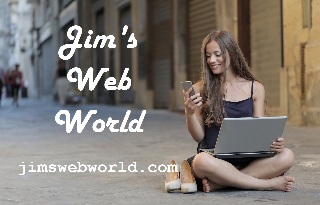 Woman happily using both her phone and her laptop