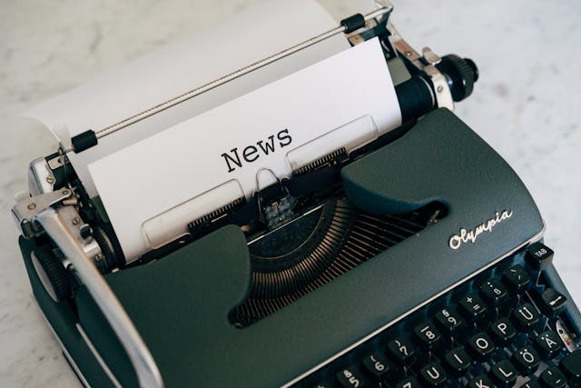 Typewriter with "News" typed on paper